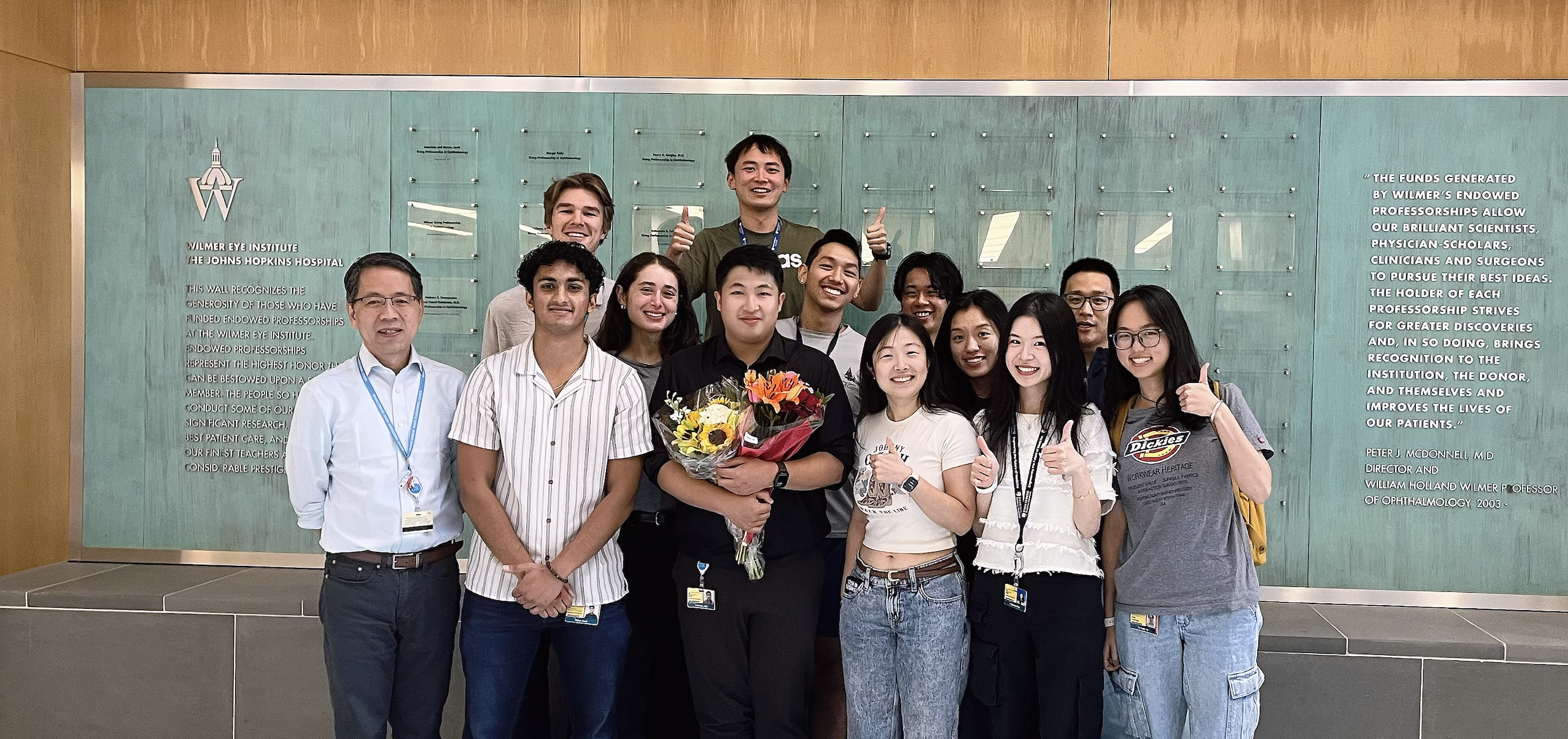 Yining Zhu with research group at Johns Hopkins